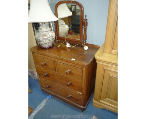A compact Satinwood Dressing Chest of two long and two short Drawers, some losses, 34'' wide x 19 1/2'' deep x 33 1/8'' high,