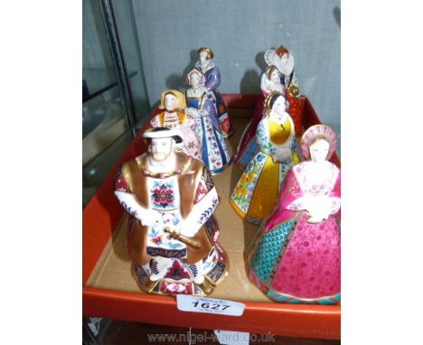 A set of Royal Worcester candle snuffers in the form of Henry VIII and his six wives plus Queen Elizabeth I