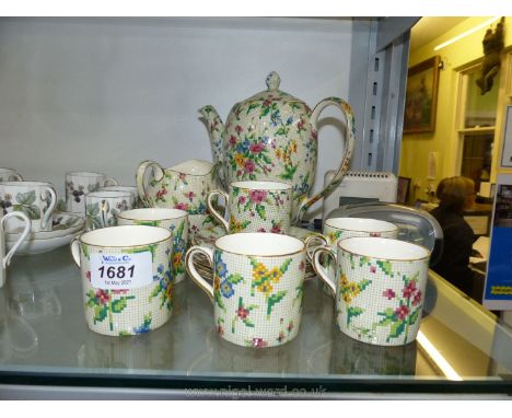 A Royal Winton Queen Ann chintz pattern coffee service for six including coffee pot, milk jug and sugar basin.