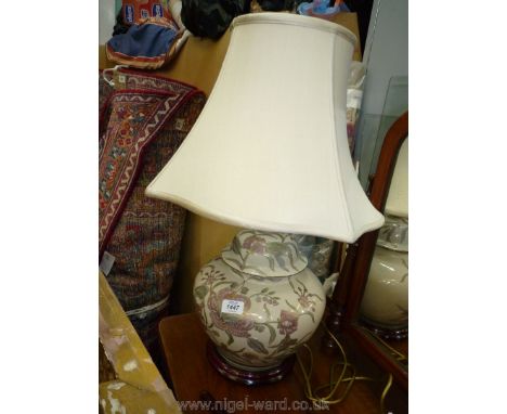 A Chinoiserie table Lamp in the form of a squat shaped lidded Ginger Jar of baluster shape, beige ground with polychrome and 