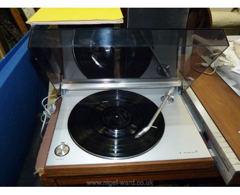 A Bang and Olufsen record deck Beogram 3000, a B&amp;O Beocentre 1400 tape deck with two large Beovox 2702 speakers and a sma