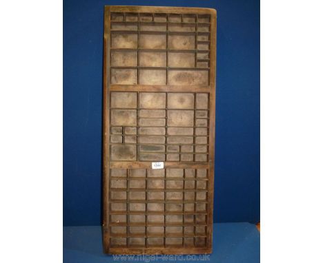 A vintage wooden printers tray, 32 1/2'' x 14 1/2''.
