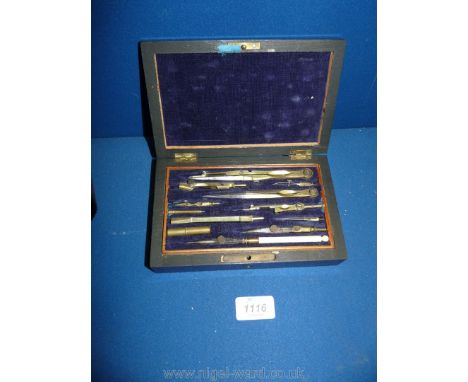 A Rosewood cased box of vintage brass and ivory draughtsman's Drawing Instruments with protractors, rulers and scales in lowe