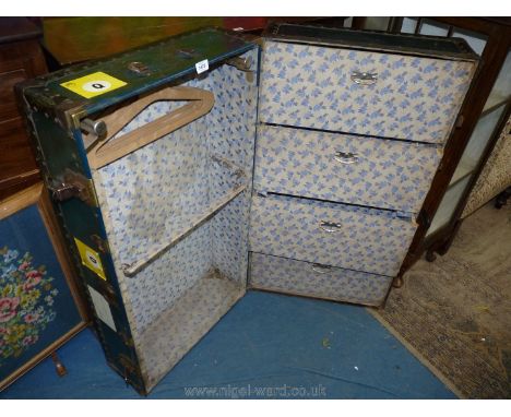 A large dark green Travelling Trunk by ''Watajoy, London'', with black leather banding, the interior with pale blue fabric li