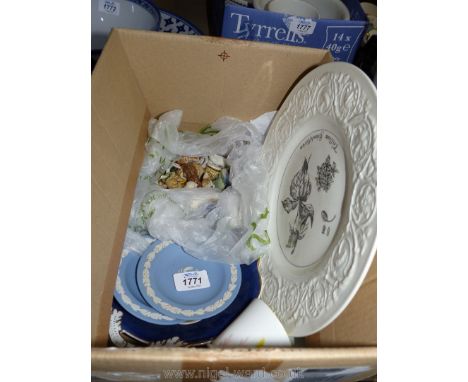 A box of ceramic including Wedgwood Botanical plate, Jasperware items, Wade Whimsies, etc.