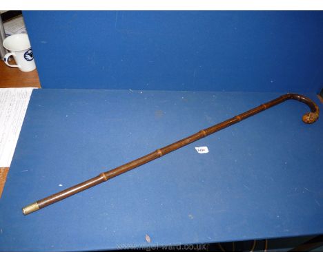 An attractive Walking Stick with bamboo effect to stick, integrated Horse Measure by Swaine &amp; Adeney, London, the ornatel