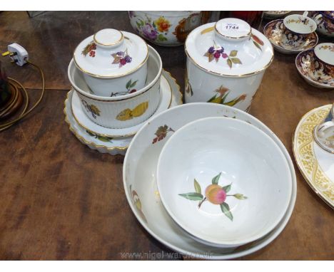 A quantity of Royal Worcester 'Evesham' including two biscuit barrels, fruit bowls, souffle dish, flan dishes etc.