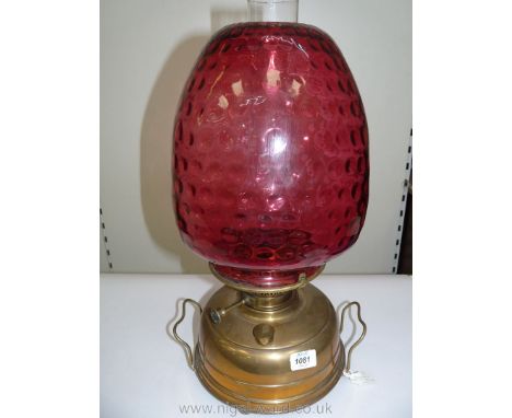 A Victorian Church oil/heater Lamp with squat brass base, having central draught, a Vertus tubular wick arrangement with a Ve