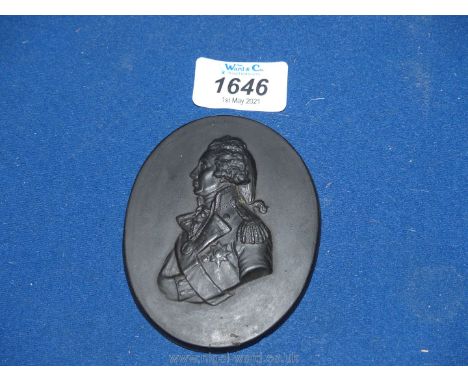 An early 19th century black basalt portrait Plaque of Nelson, probably Wedgwood but unmarked, 3 1/2" diameter.