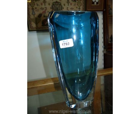 A heavy Waterford Crystal vase in light blue, 12" tall.