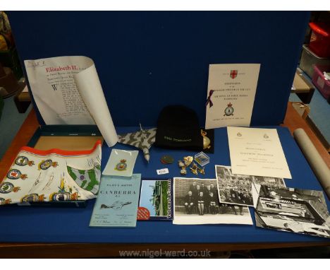 A small quantity of RAF memorabilia including a letter from the Queen of promotion to flying officer, a book 'Pilot's notes C