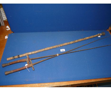 A pair of Ladies and Gents Epee swords, 38 1/2'' and 35 3/4'' long, both a/f and a Bamboo walking Cane decorated with snakes,