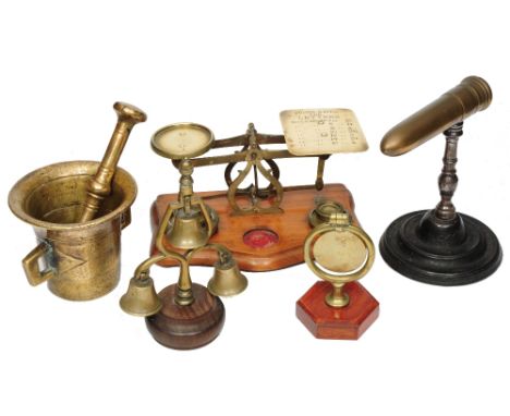 A VICTORIAN BRONZE GOFFERING IRON on a turned column by J Turner, 16.8cm high, a brass pestle and mortar, a set of brass post