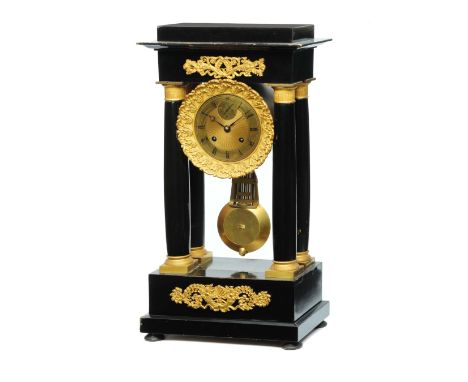 A 19TH CENTURY FRENCH PORTICO CLOCK, the gilt brass dial with Roman chapter ring, engine turned centre, subsidiary seconds at