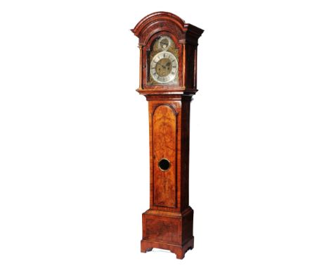 AN 18TH CENTURY WALNUT 8 DAY LONGCASE CLOCK the 12" break arch dial with silvered Roman chapter ring, sword hilt half hour ma