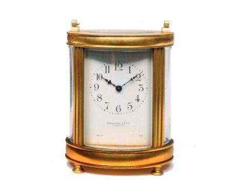 A FRENCH OVAL CARRIAGE TIMEPIECE with white enamel Arabic dial inscribed Page Keen &amp; Page, Plymouth, Paris made, with sil