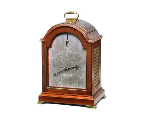 A GEORGE III MAHOGANY BRACKET CLOCK the break arch silvered Roman dial with Arabic five minutes signed Henry Taylor, London  