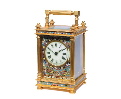 A 19TH CENTURY FRENCH CARRIAGE TIMEPIECE with circular ivory enamel Roman dial and champlevé enamel foliate mask, platform cy