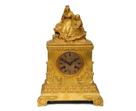 A 19TH CENTURY FRENCH ORMOLU MANTEL CLOCK with silvered engine turned Roman dial and moon hands, the movement with silk suspe