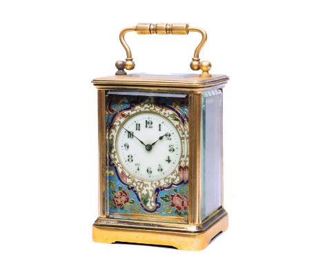 A 19TH CENTURY FRENCH CARRIAGE TIMEPIECE the circular ivory enamel Gothic dial with champlevé enamel foliate mask, silvered p