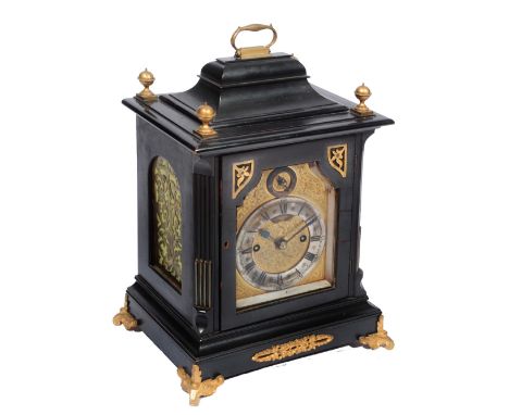 AN 18TH CENTURY STYLE EBONISED BRACKET CLOCK, the foliate scroll gilt brass dial with silvered Roman chapter ring, Arabic fiv