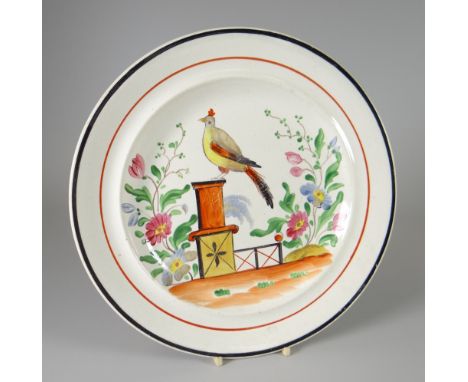 A DILLWYN POTTERY CREAMWARE PLATE decorated in enamel, with bird on pedestal scene, impressed mark, 25cms diam Condition Repo