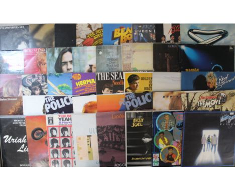 Collection of over 60 Vinyl Albums including The Beatles, David Bowie, Bob Dylan, Nancy and Lee, ELP, Uriah Heep, T. Rex, Sma