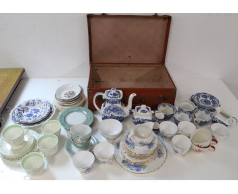 Travel case containing various assorted ceramic tea sets&nbsp;