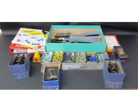 Large box of Meccano boxed motors, spare parts instructions and books of models including 3 pamphlets for Set No1, as well as