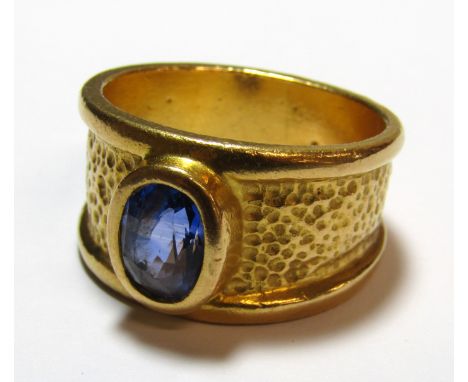 22K (tested as high ct 18-22) gold gentleman's ring with oval blue sapphire approx. 9mm x 6mm - ring size 1 - total weight 26