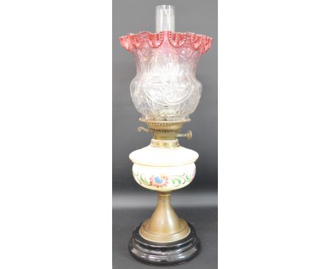 Paraffin lamp with opaque painted glass reservoir &amp; clear / cranberry glass shade