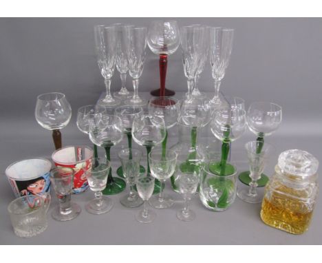 Collection of glassware includes coloured stem wine glasses, old glass, water jug and matching glass, etc also a decanter con