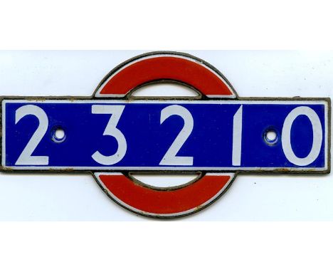 Enamel 'bullseye' STOCK-NUMBER PLATE from 1949 London Underground R47-Stock (District Line) Non-Driving Motor Car 23210. Thes