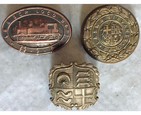 Pre-Grouping RAILWAY CAP BADGES comprising an LB&SCR Loco Dept engine driver's badge, a L&SWR Servants' Band badge and a gene