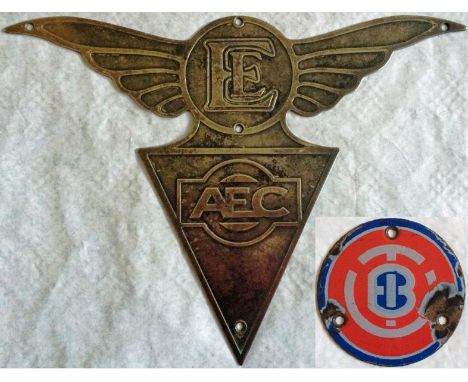 VEHICLE BADGES comprising a brass AEC PLATE surmounted by wings and the letters 'EE' (operator unknown) and an enamel WHEEL-H