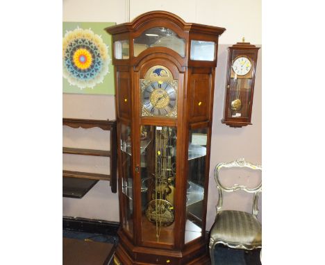 AN ITALIAN LONGCASE CLOCK IN AN ANGLED CABINET WITH THREE ENGRAVED WEIGHTS AND PENDULUM - H 207 CM