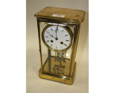 A FRENCH BRASS FOUR GLASS MANTEL CLOCK WITH JAPY FRERES MOVEMENT, white enamel dial with Roman numerals, the four glass case 