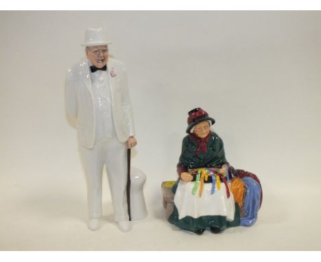 A ROYAL DOULTON WINSTON CHURCHILL FIGURE TOGETHER WITH A ROYAL DOULTON SILKS &amp; RIBBONS FIGURE