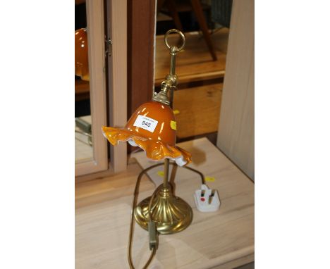 A SMALL BRASS READING LAMP