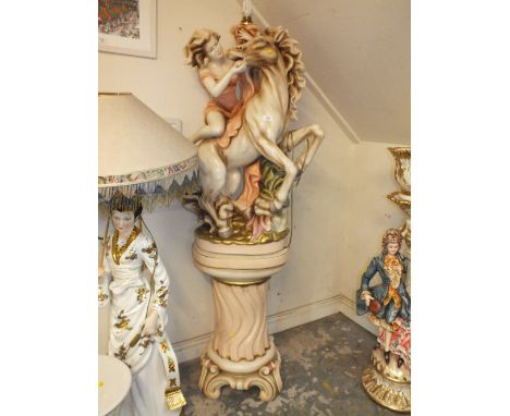 A LARGE RESIN FLOORSTANDING LAMP MODELLED AS A GIRL ON HORSEBACK ON PLINTH - OVERALL H 188 CM TOGETHER WITH A CIRCULAR FROSTE