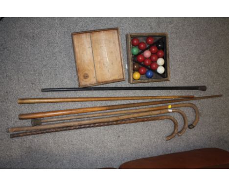 A COLLECTION OF VINTAGE WALKING STICKS AND CANES TO INCLUDE WHITE METAL TOPPED EXAMPLES&nbsp;TOGETHER WITH A CASED SNOOKER SE