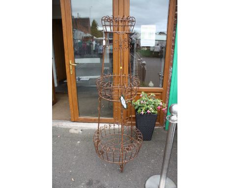A THREE TIER DEER PARK IRONWORKS GARDEN PLANTER  - H 167 CM