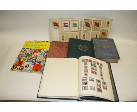 A COLLECTION OF VINTAGE STAMPS AND CIGARETTE CARDS TO INCLUDE SILK EXAMPLES