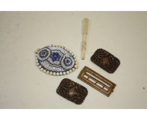 A BAG OF VINTAGE BELT BUCKLES ETC. TO INCLUDE A BEAD WORK EXAMPLE