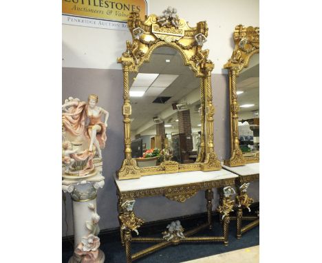 A HUGE GILT MARBLE TOPPED CONSOLE TABLE WITH MIRROR, DECORATED WITH FIGURATIVE CHERUBIC DETAIL - H 260 CM, W 124 CM