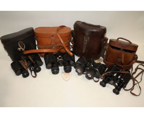 FOUR PAIRS OF VINTAGE LEATHER CASED BINOCULARS TO INCLUDE NEGRETTI &amp; ZAMBRA, MILITARY CARL ZEISS ETC