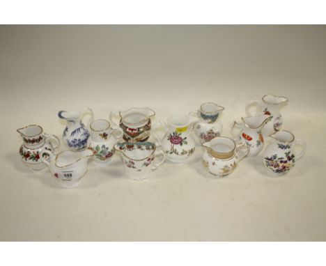 A COLLECTION OF ROYAL WORCESTER CREAM JUGS ETC (12)