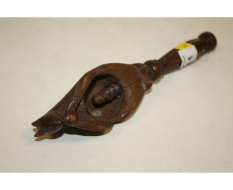 AN UNUSUAL CARVED BLACK FOREST STYLE SQUIRREL SHAPED NUT CRACKER
