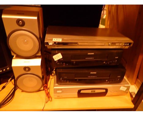 Two DVD players, two video cassette players and a pair of speakers. Not available for in-house P&amp;P, contact Paul O'Hea at