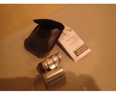 New old stock jewellers loupe with LED light instructions and carry case. P&amp;P Group 1 (£14+VAT for the first lot and £1+V